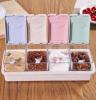 Multi-coloured seasoning set with spoons and holder
